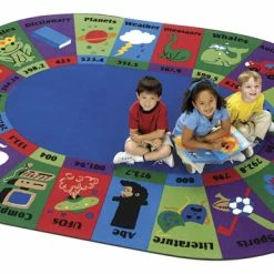 Flash Sale 🤩 Carpets For Kids Dewey Decimal Fun Rug, 6 Feet 9 Inches X 9 Feet 5 Inches, Oval, Blue 👍